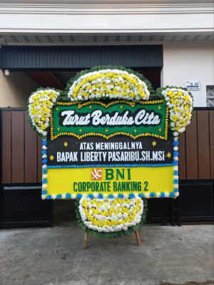 Papan Bunga Duka di Motto