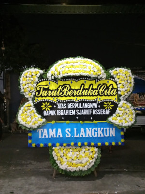 Papan Bunga Duka di Motto
