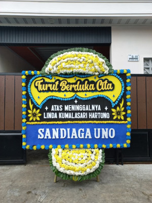 Papan Bunga Duka di Motto