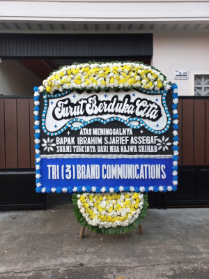 Papan Bunga Duka di Motto